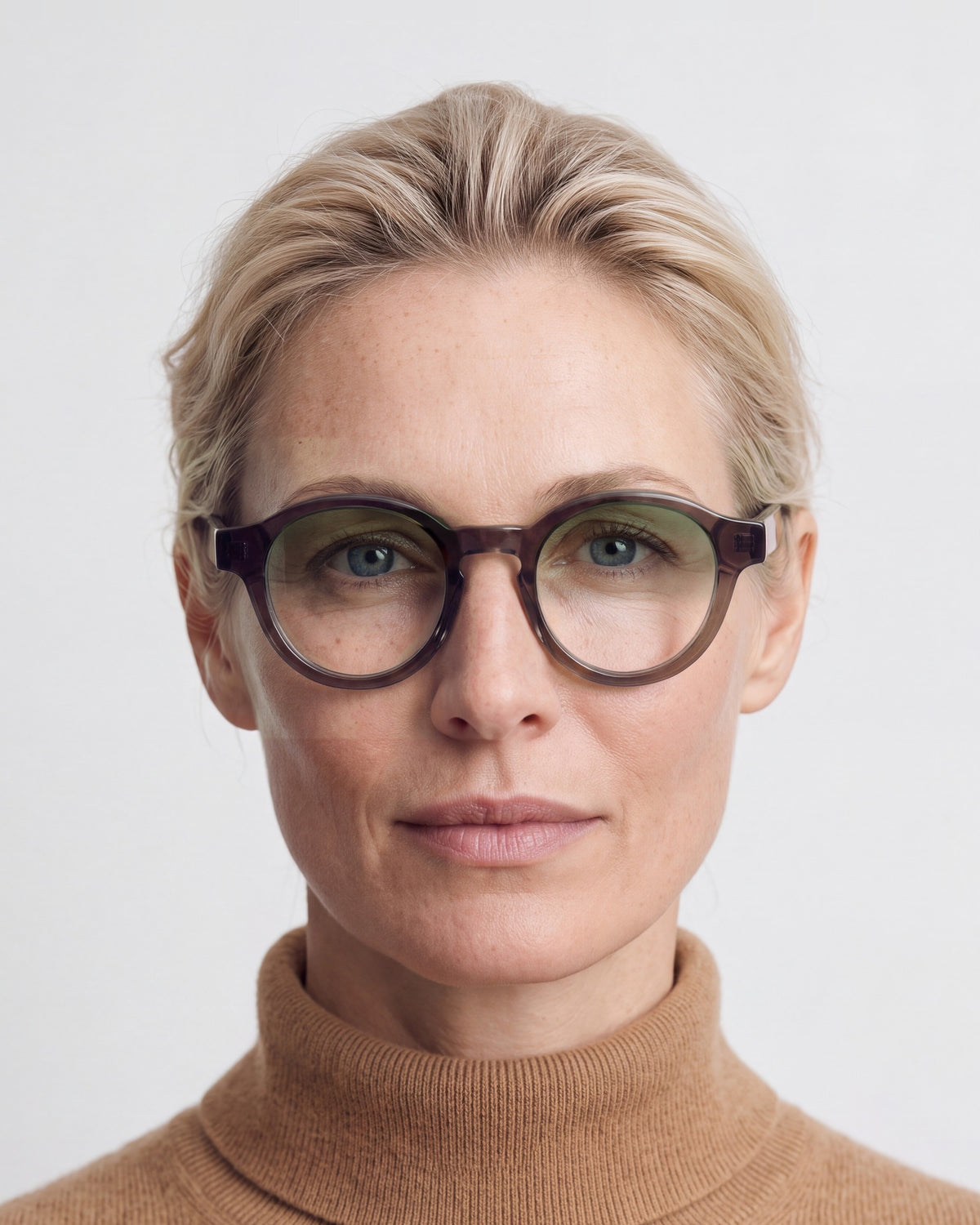 Nora in dark brown, worn, Sage lenses